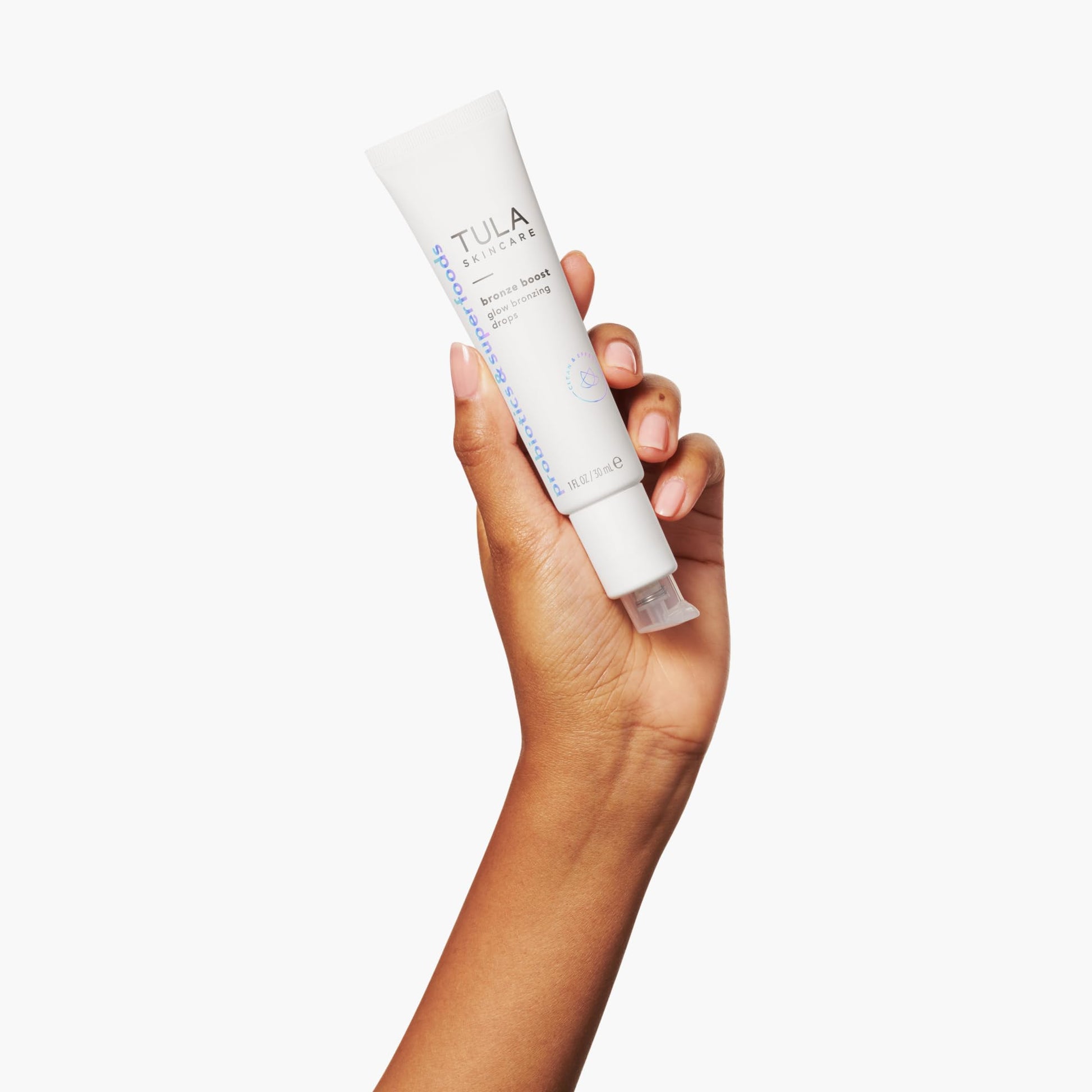 TULA 1 Fluid Ounce bronzing serum packaging showing ingredient details.