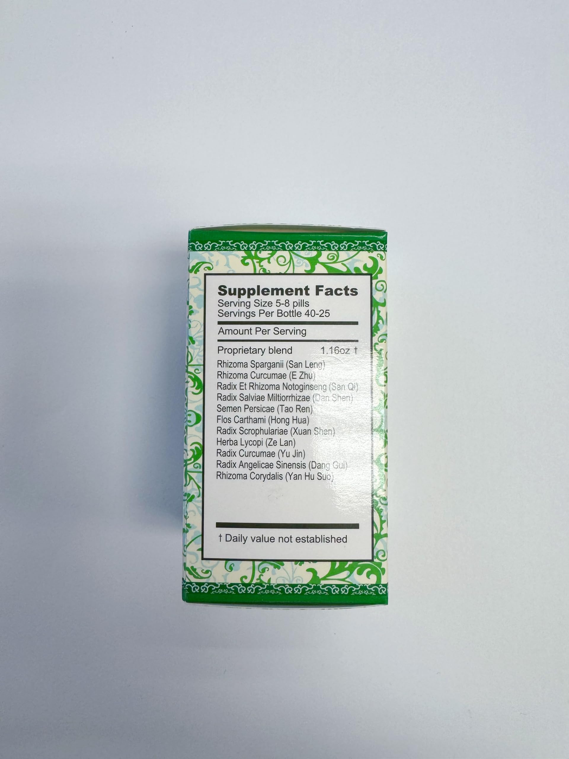 Side view of Millennia herbal supplement packaging with product facts and manufacturing details.