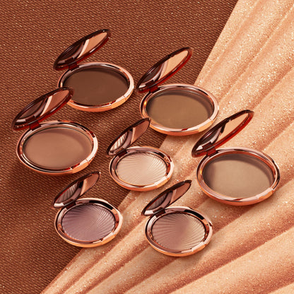 EstÃ©e Lauder Bronze Goddess face and body matte powder applicator brush view