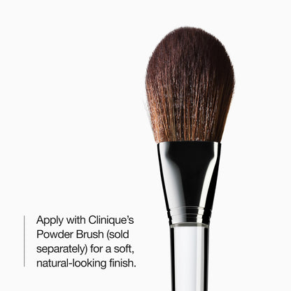 Clinique True Bronze face bronzer compact held open revealing the integrated travel mirror and product pan.