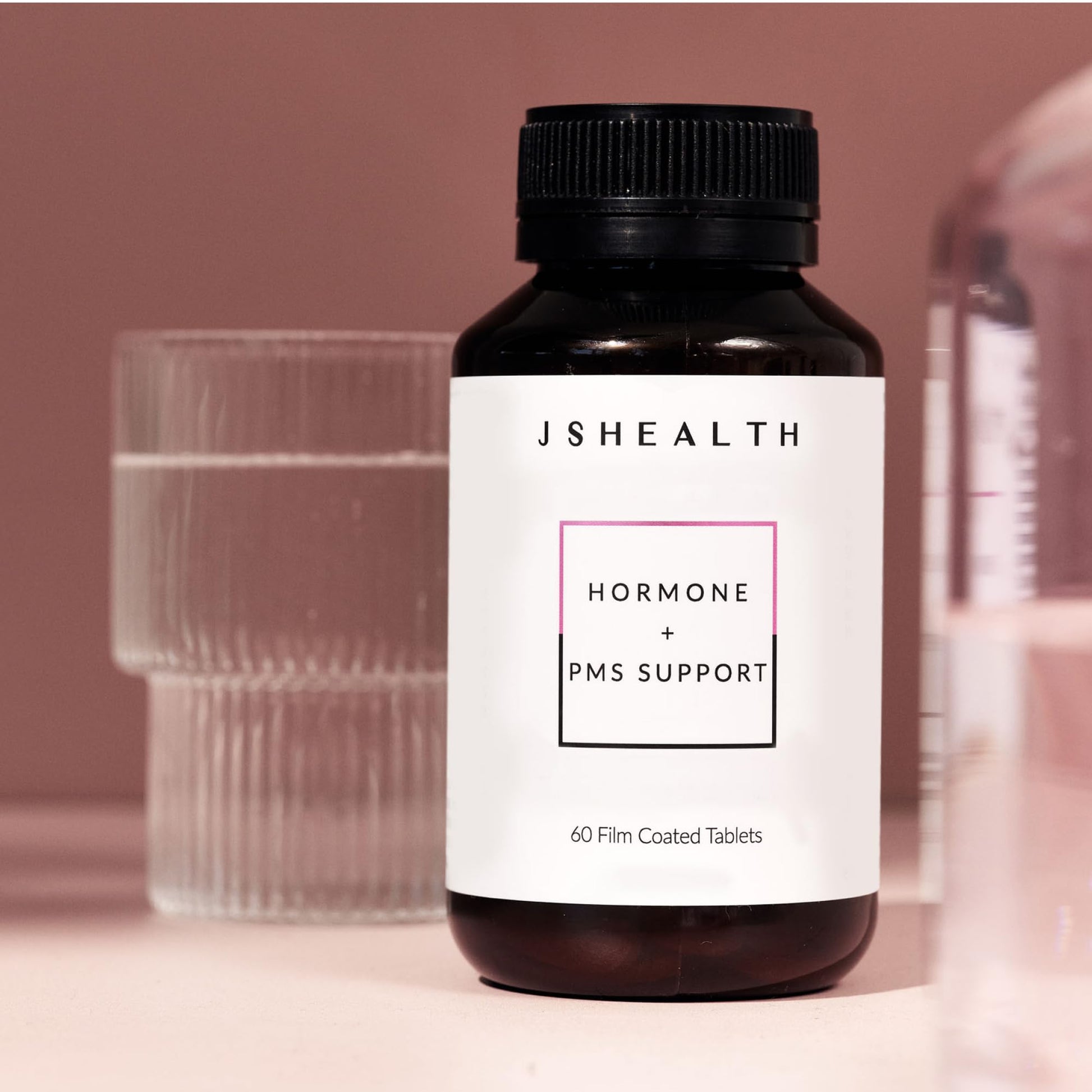 Close up view of the directions and warnings label on JSHealth PMS Support bottle.