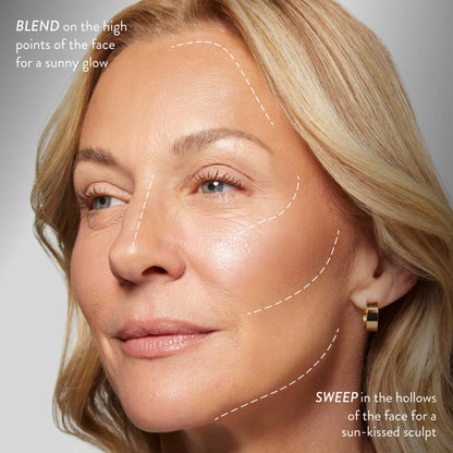 Imported Laura Geller Baked Bronze-N-Brighten powder showing the weightless and creamy texture swatch.