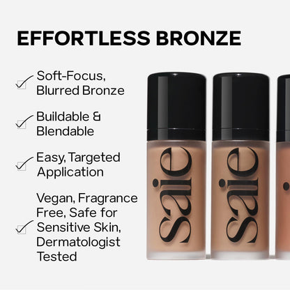 Applying Saie liquid contour stick to cheekbones for a sun kissed glow