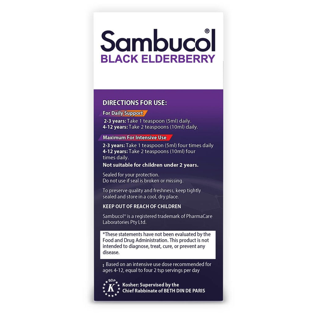 Child holding Sambucol black elderberry syrup bottle