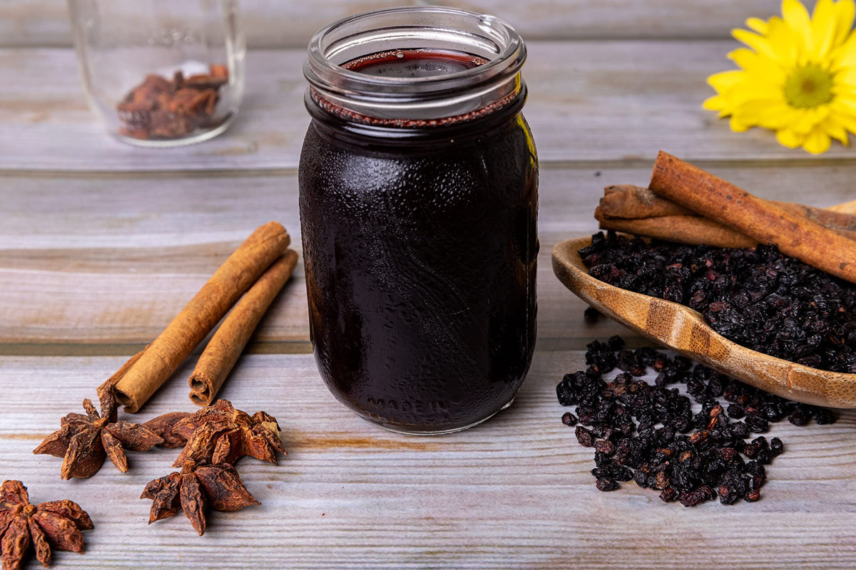 Rich purple antioxidant elderberries ideal for making homemade wellness tea and gummies