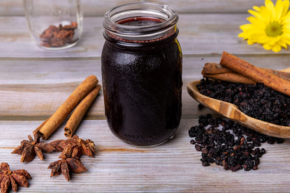 Rich purple antioxidant elderberries ideal for making homemade wellness tea and gummies