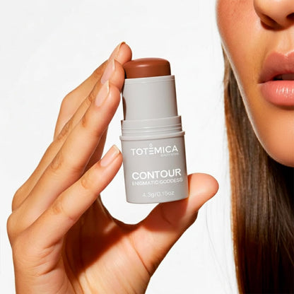 Close up of the non greasy nourishing contour stick formulation containing vitamin E and cocoa butter.