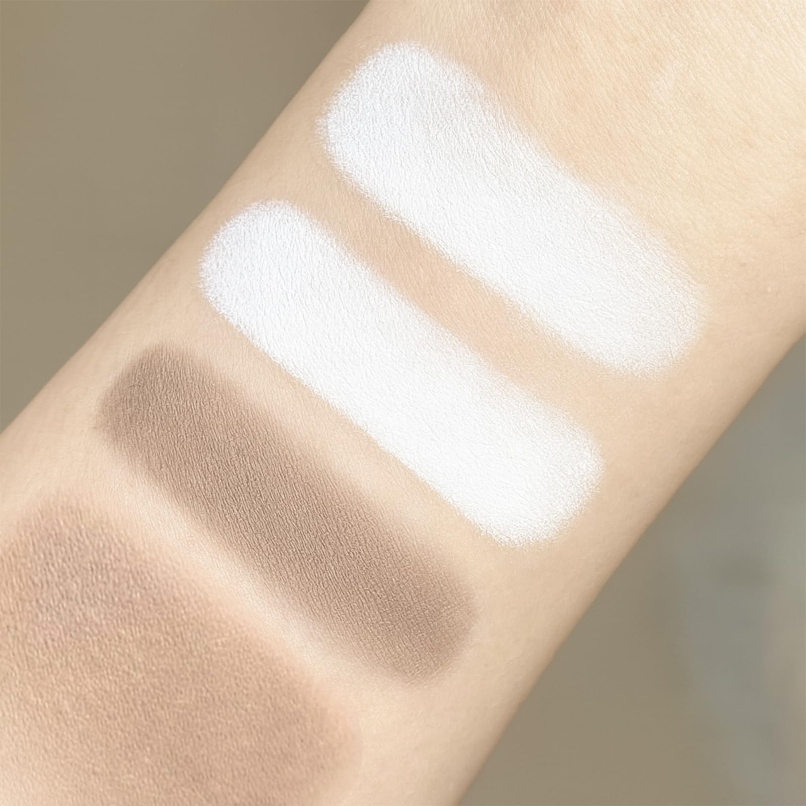 Close up of the built-in makeup brush end on the Erinde travel size cream bronzer stick.