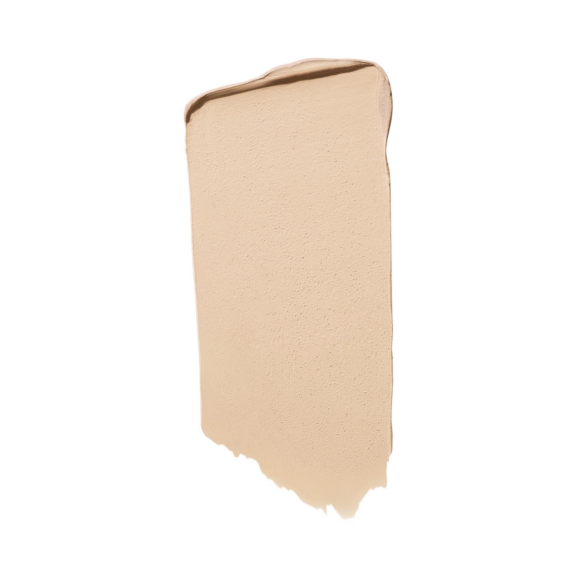 Well People clean makeup stick uncap view showing the 14 Fair Neutral cream domed bullet head