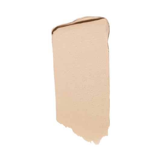 Well People clean makeup stick uncap view showing the 14 Fair Neutral cream domed bullet head