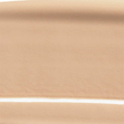 Close-up of the applicator spatula inside Wet N Wild Photo Focus Matte Liquid Foundation bottle
