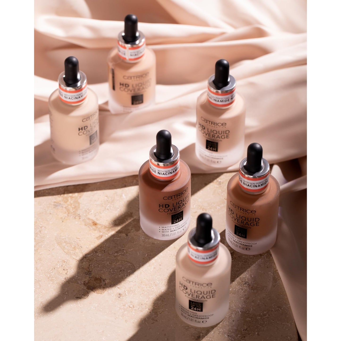 Comparison view of Catrice HD Liquid Coverage Foundation shade 010 Light Beige against a neutral background