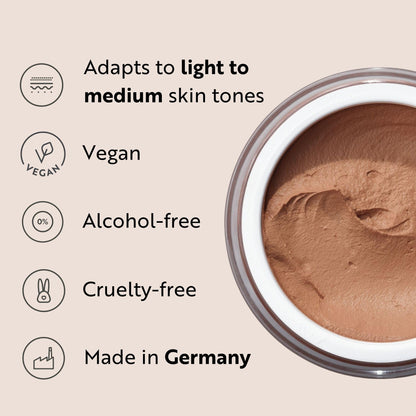 Side perspective of the premium M Asam 30ml makeup jar displaying the international product labels and directions.