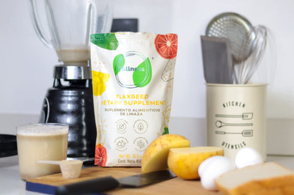 Flaxseed supplement powder by Ginger being scooped for smoothie preparation