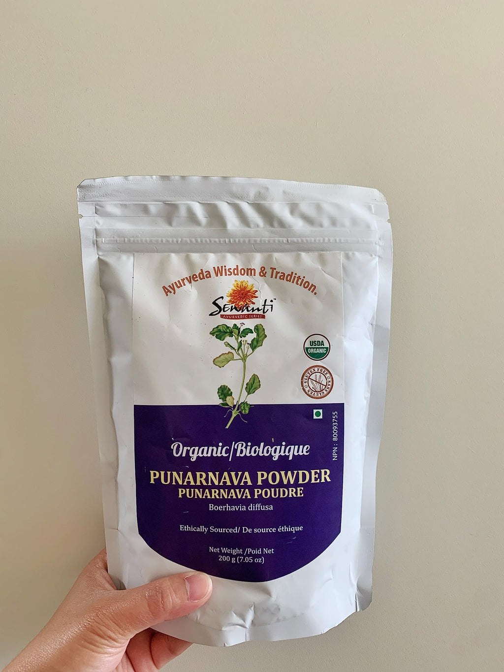 Imported Sewanti wellness supplement container showing organic seals and product weight.