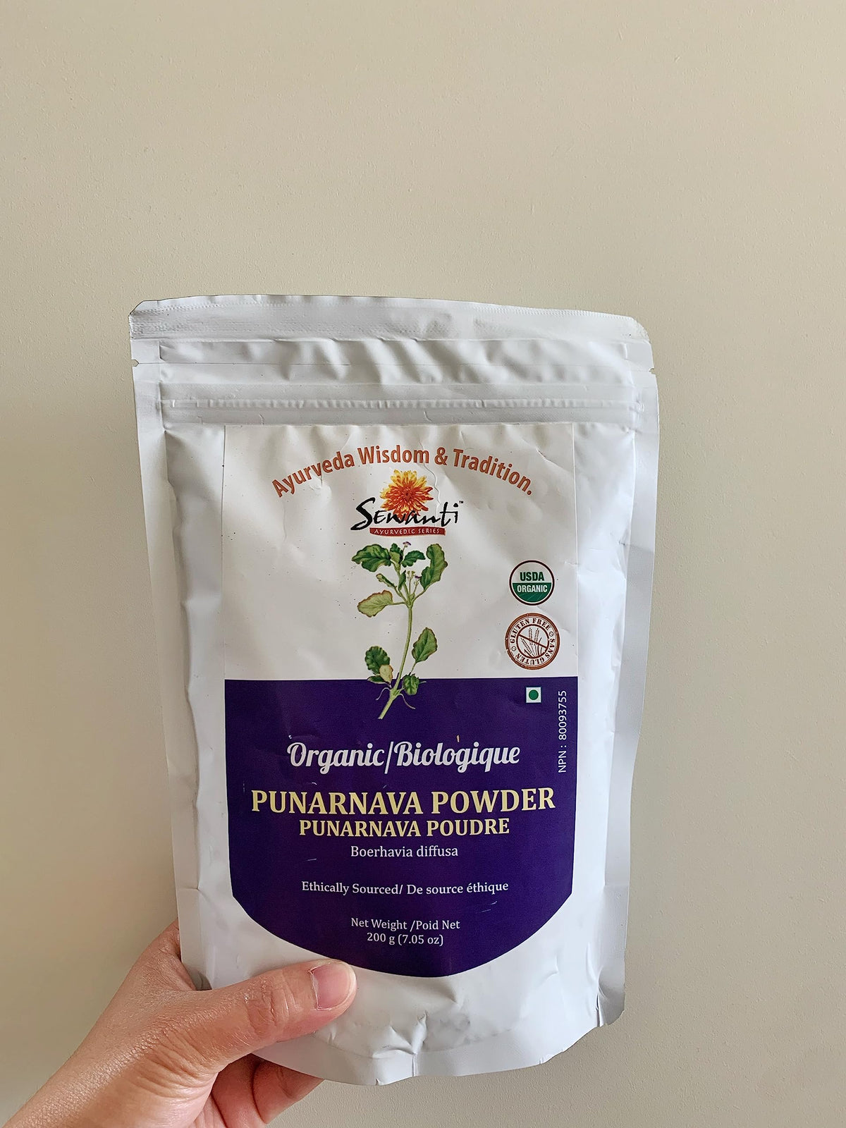 Imported Sewanti wellness supplement container showing organic seals and product weight.