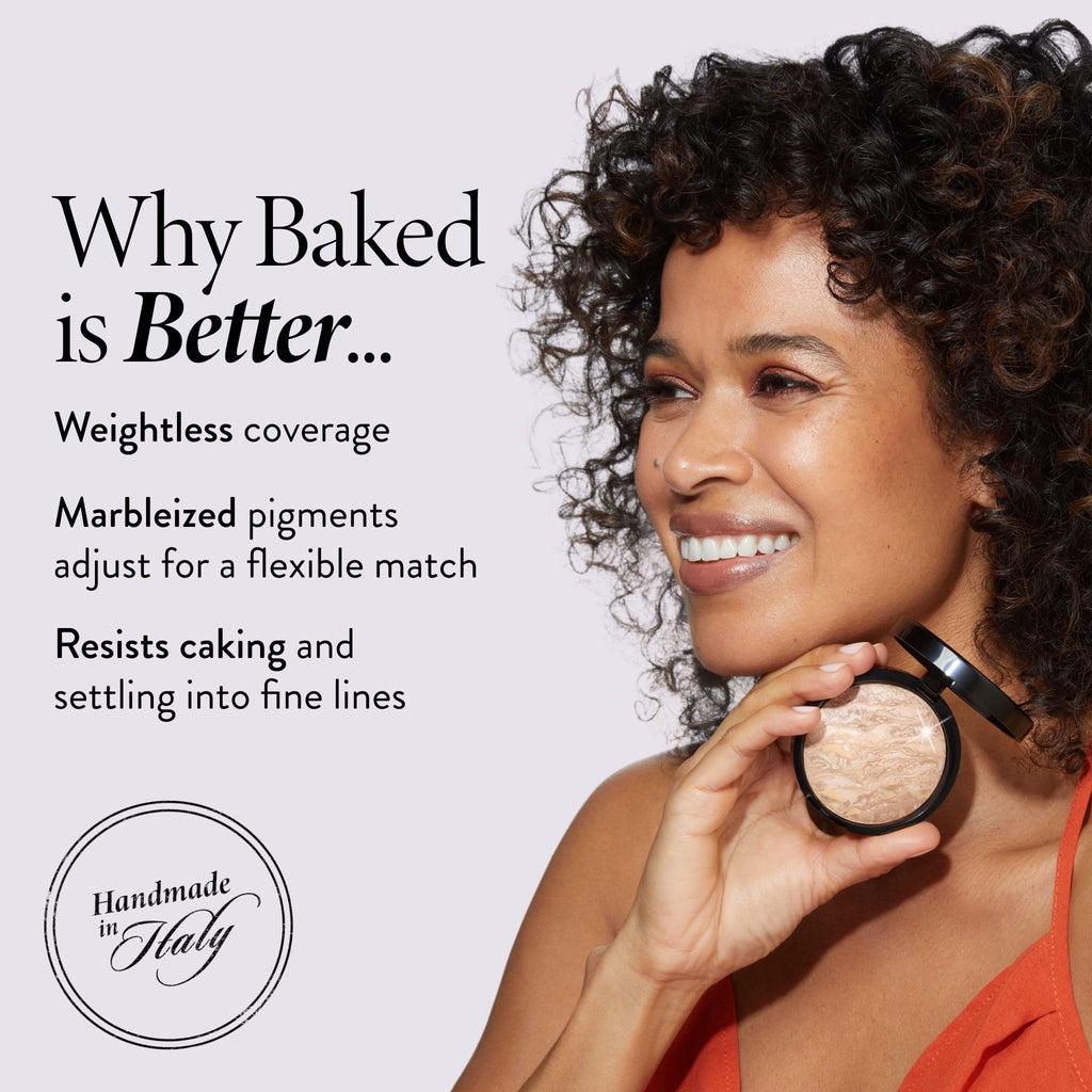 Laura Geller face makeup powder compact shown angled on surface