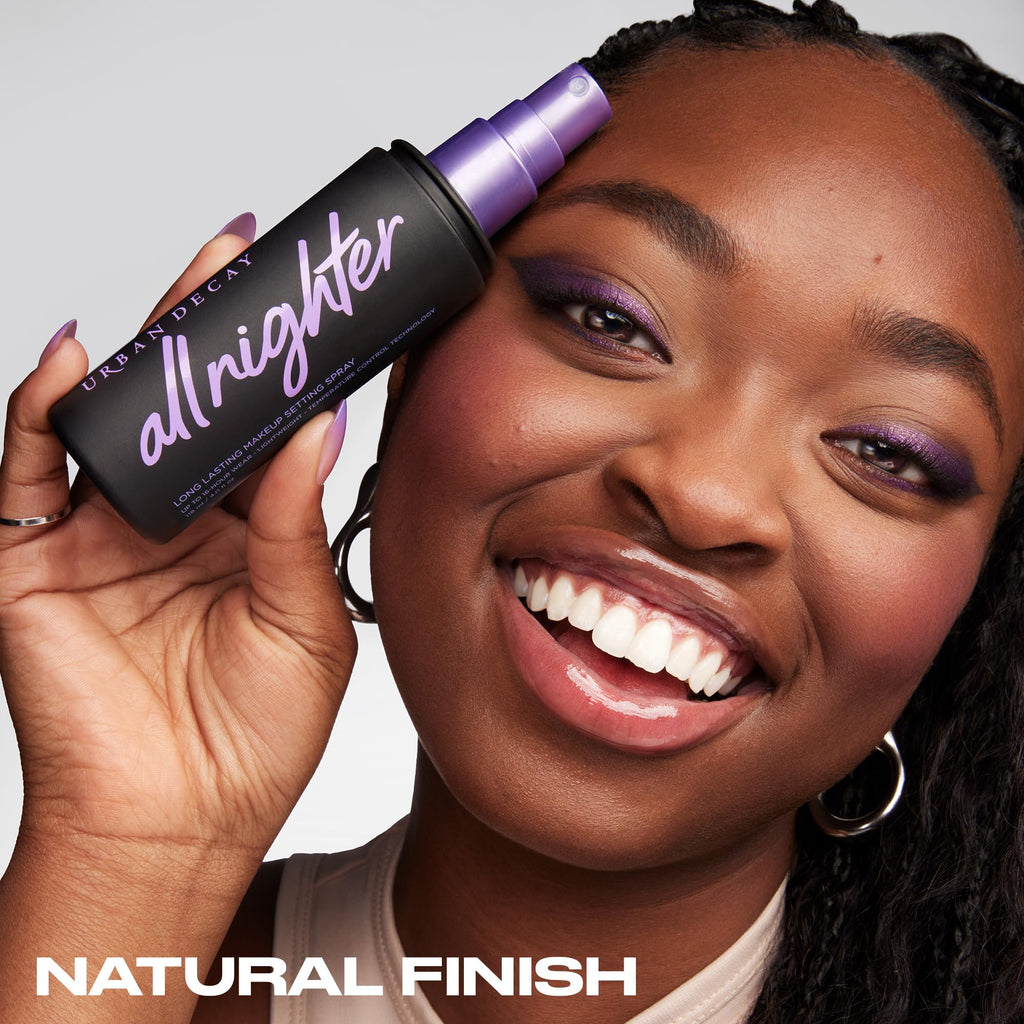 Urban Decay All Nighter makeup setting spray held in hand
