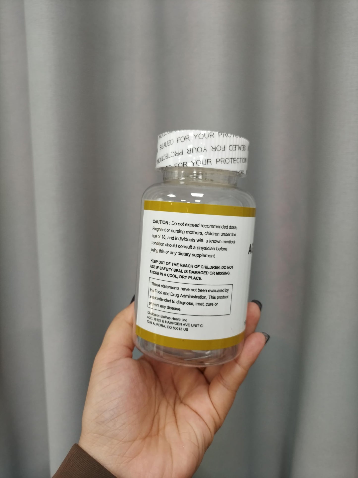 Back label view of RTQSU aged garlic extract showing non-GMO dietary features.