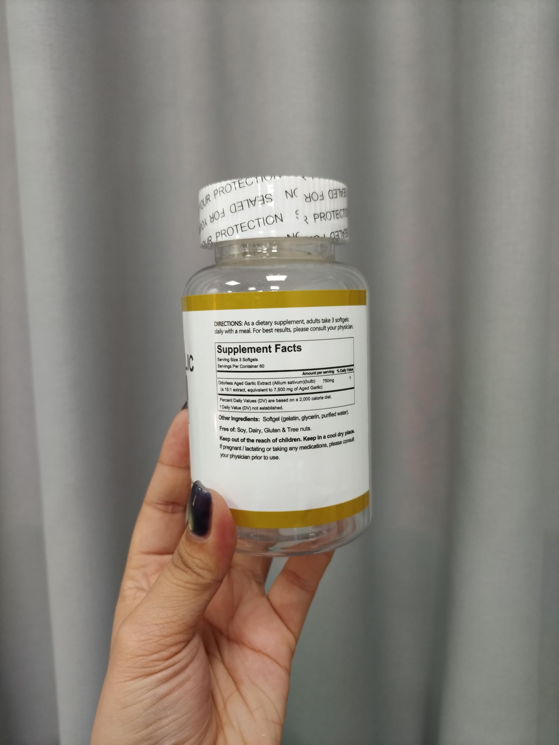 Secure packaging of authentic RTQSU premium aged garlic extract softgels.