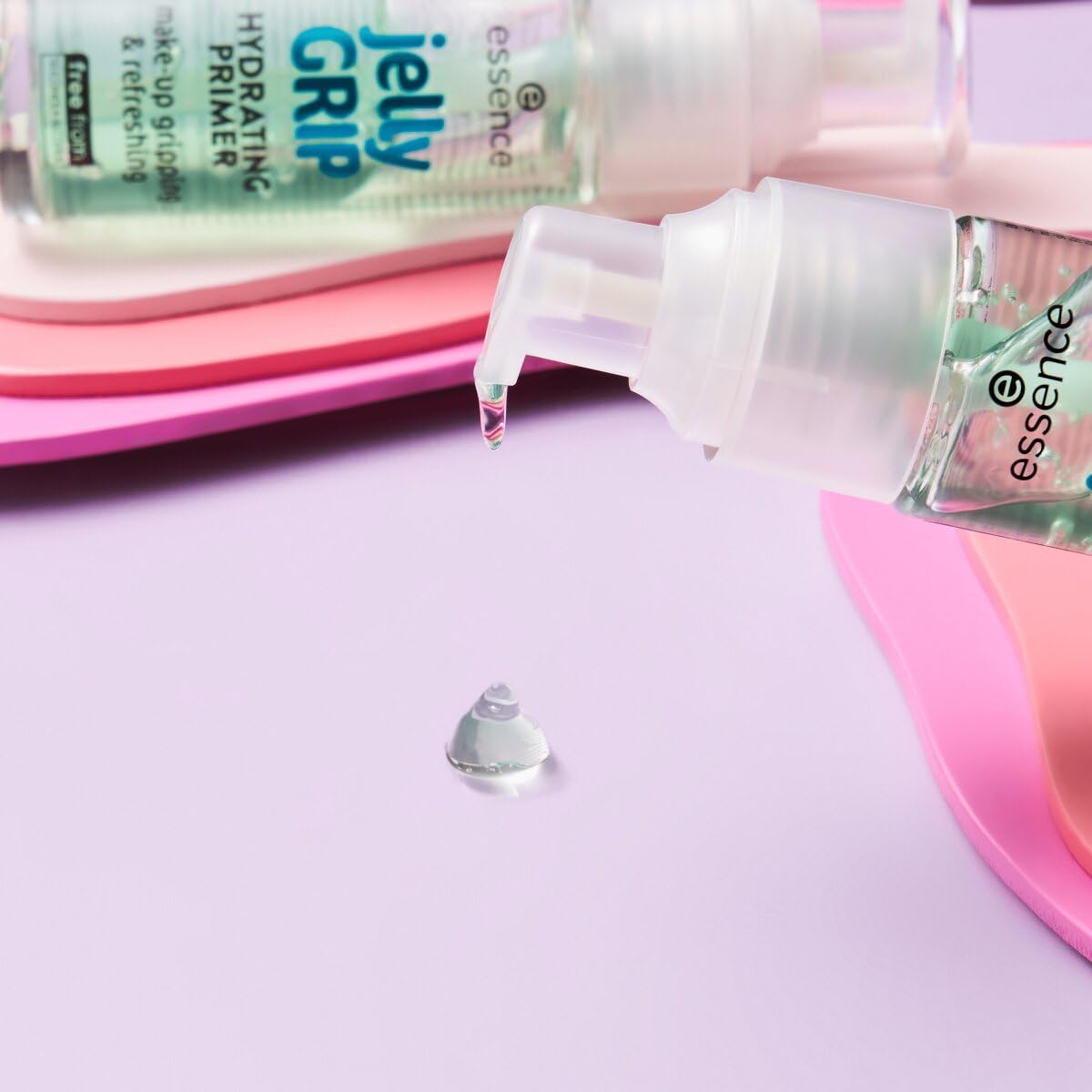 Essence Jelly Grip Hydrating Primer lifestyle flatlay with makeup products