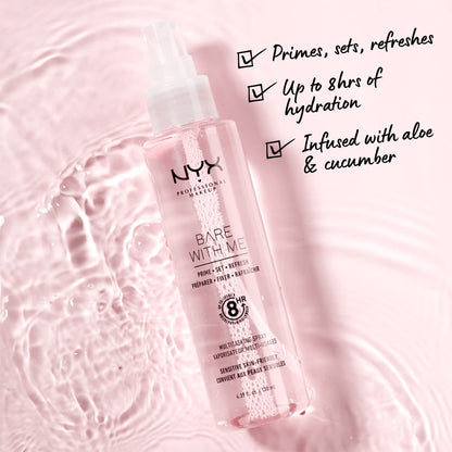 Nyx Bare With Me spray being applied as a makeup primer