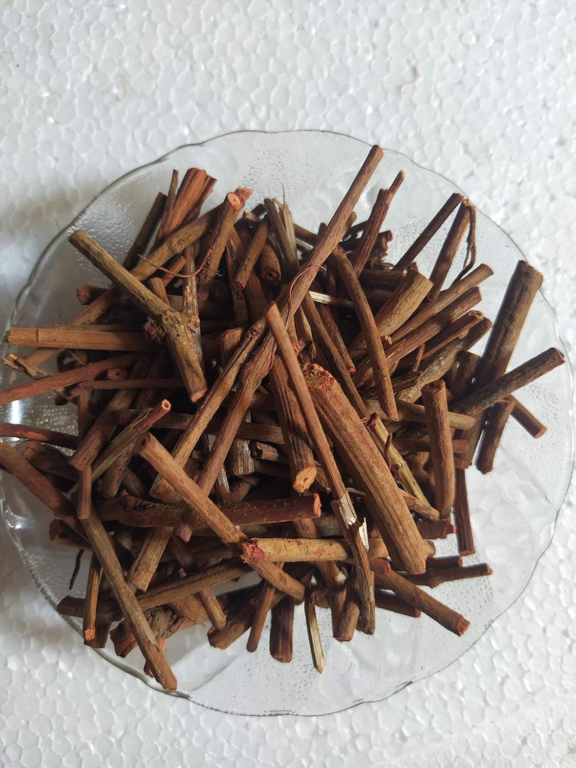 Close up of raw Manjistha root sticks Rubia cordifolia