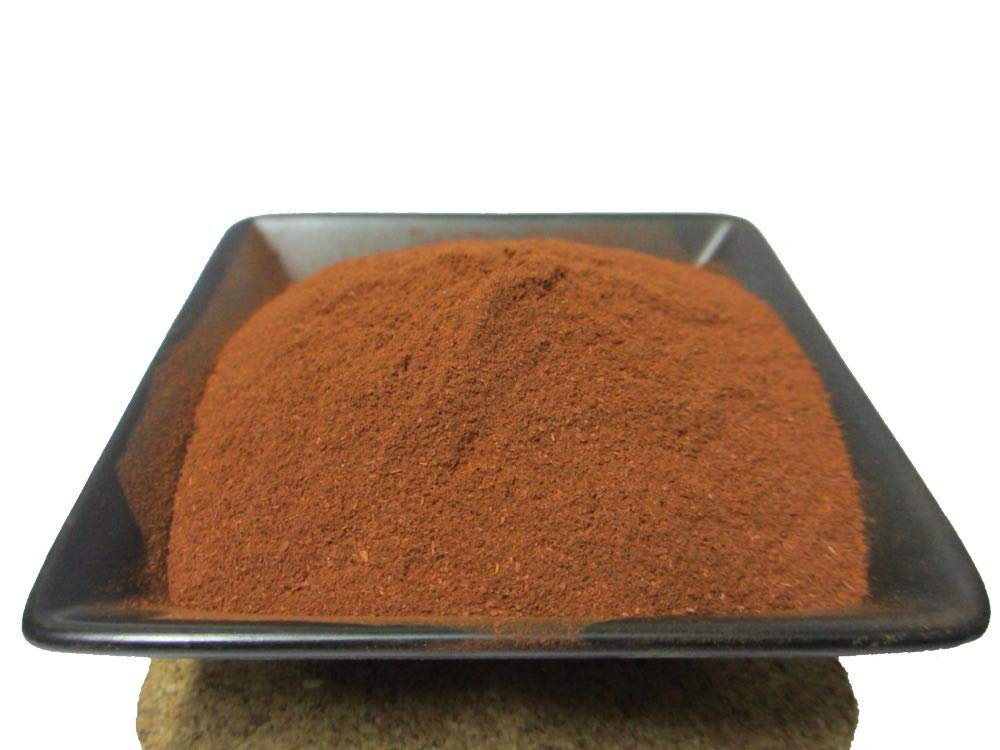 Authentic organic Manjistha churna highlighting its rich reddish brown color for natural Ayurvedic face packs.
