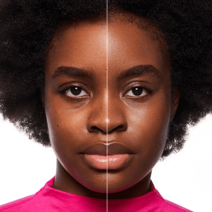 essence Glow Booster liquid primer swatches on hand highlighting the luminous texture