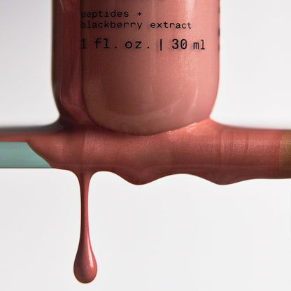 Versed liquid highlight and bronzing drops bottle showing product consistency.
