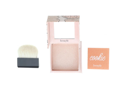 Benefit Cookie Golden Pearl Highlighter compact showing the ultra-fine texture, built-in mirror, and custom rounded brush.
