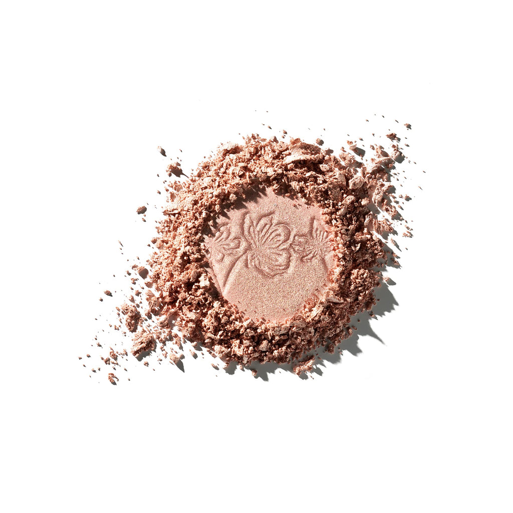 Catrice Supreme Rose Beam highlighter swatch on skin showing metallic shimmer