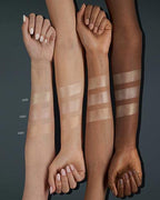 Catrice pressed powder highlighter styled alongside makeup application brush