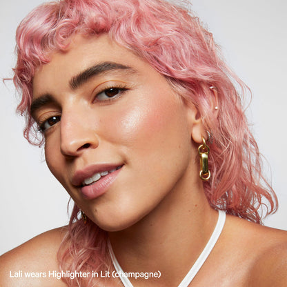 Milk Makeup clean vegan cream highlighter stick Lit shade application angle
