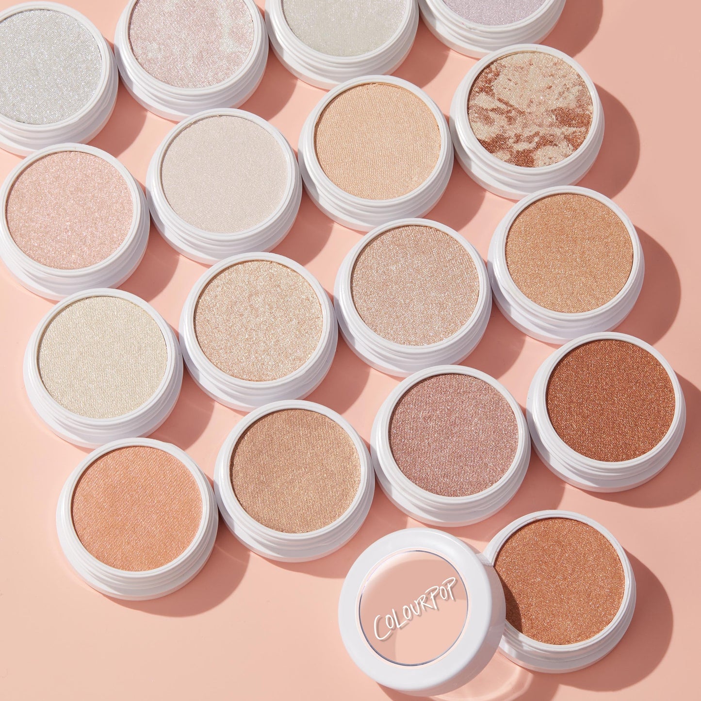 Side angle of closed white screw top pot for weightless cream face makeup.