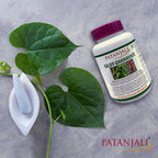 Side profile of Patanjali Giloy Ghanvati 60 tablets packaging showing dosage directions