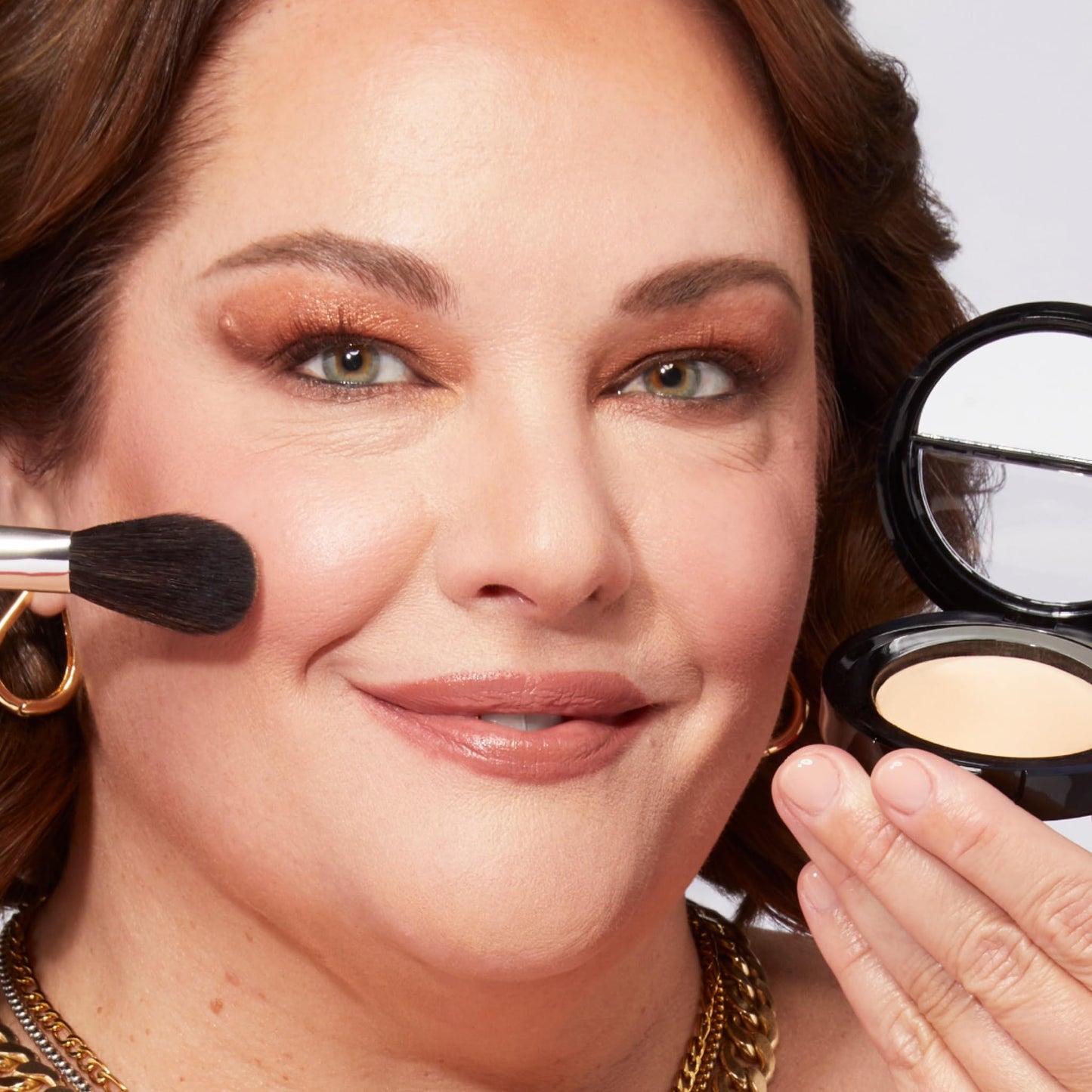 Laura Geller Baked Original Low Glow Illuminating Highlighter open compact displaying dome texture