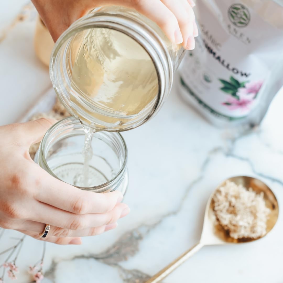 Marshmallow root herb in a glass bowl for infusion preparation