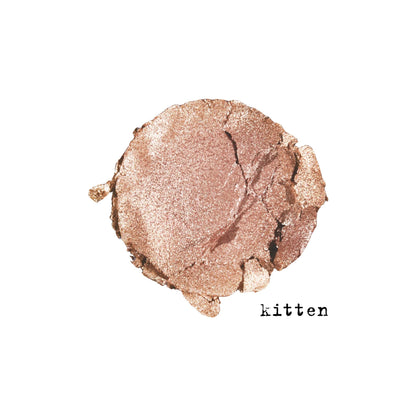 Stila bouncy cream illuminator gold compact open showing smooth putty texture