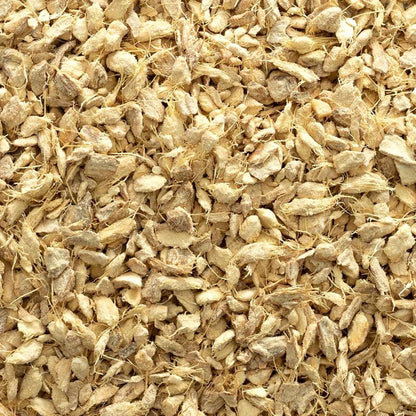 Brewing homemade ginger root herbal tea with dried loose pieces