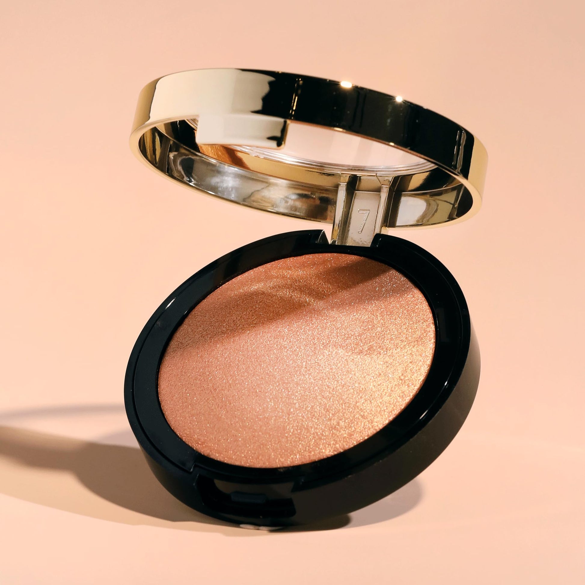 Milani multi tonal micro fine luminescent powder highlighter application
