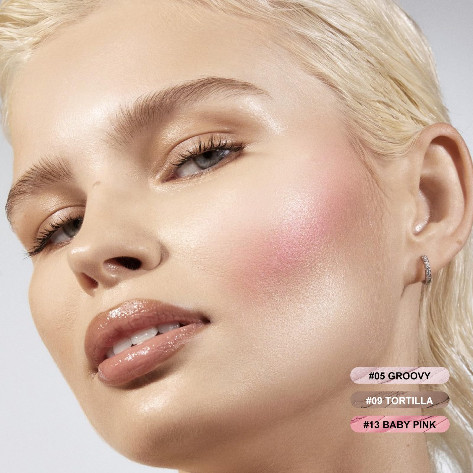 Open makeup pens showing the cream contour blush and highlighter shades side by side