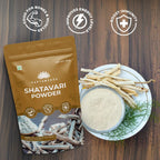 Ayurvedic female wellness powder mixed in a glass of warm milk