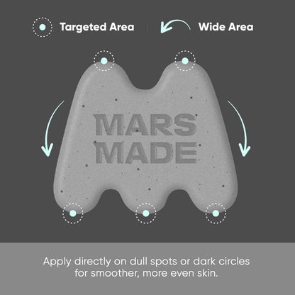 Mars Made facial cleansing bar held in hand for scale