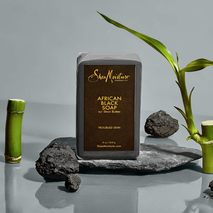 SheaMoisture natural skincare bars stacked to showcase the compact size and authentic color