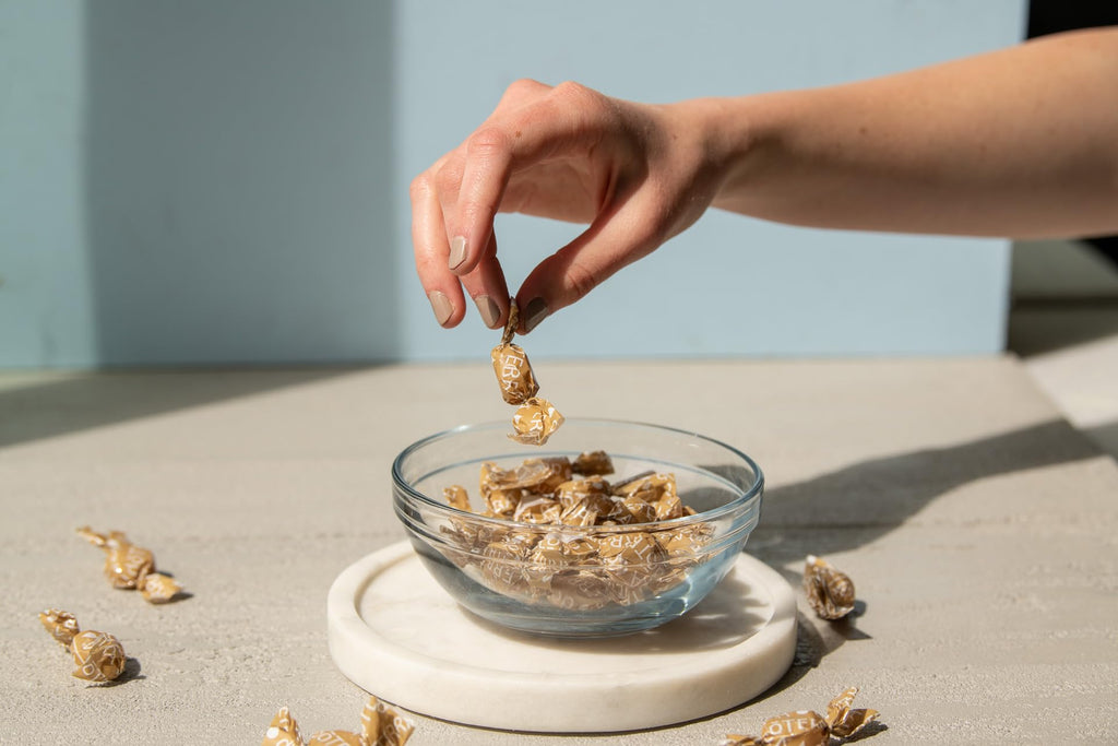 DoTERRA Ginger Digestive Drops herbal supplement bag displayed with natural ginger and lemon flavor cues
