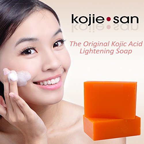 Kojie San skin lightening soap bars arranged with the iconic logo highlighting dark spot remover benefits