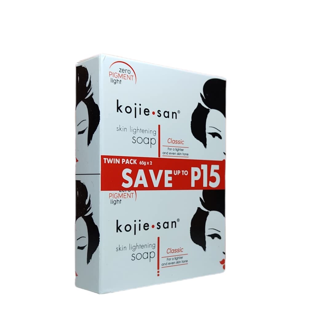 Side angle view of the four pack Kojie San skin brightening soap showing dimensions and brand authenticity seals