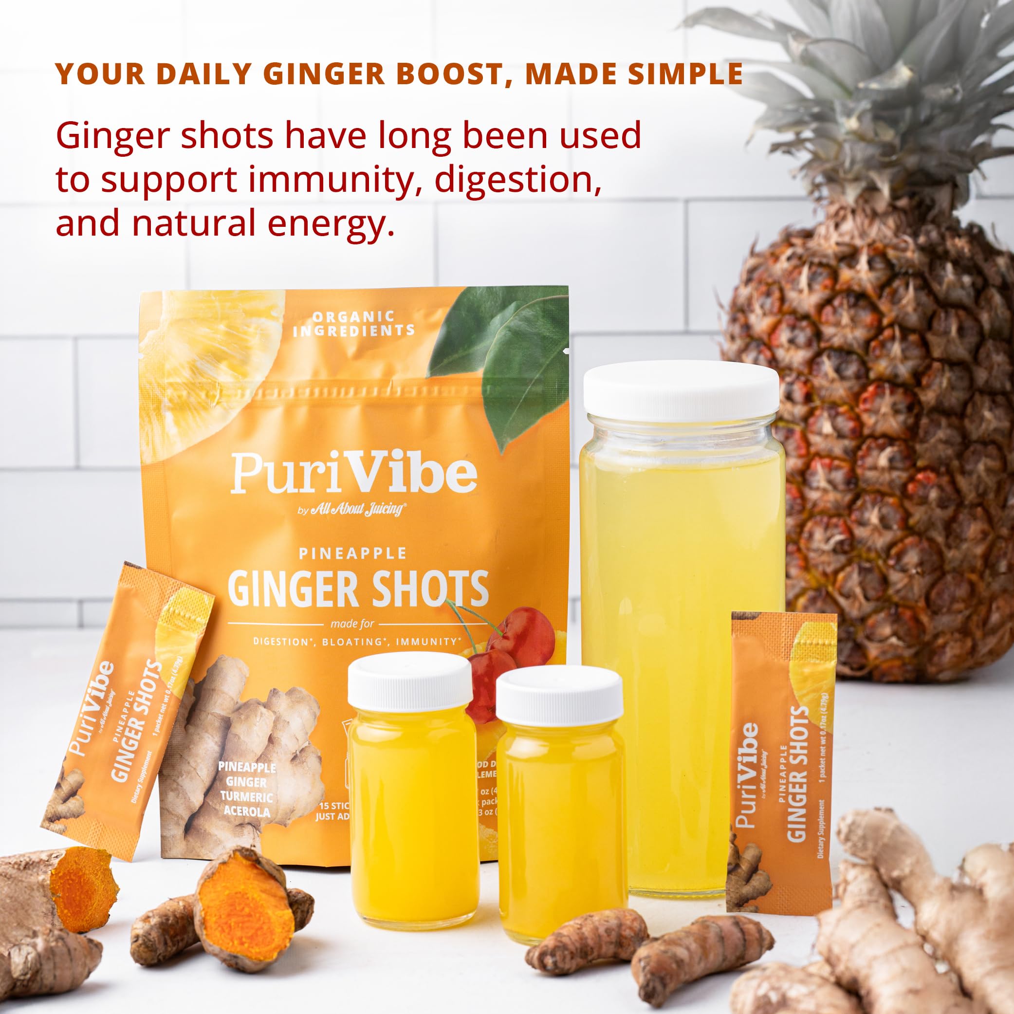 PuriVibe Pineapple Ginger Shots individual stick packets arranged next to a premium glass mixing bottle.