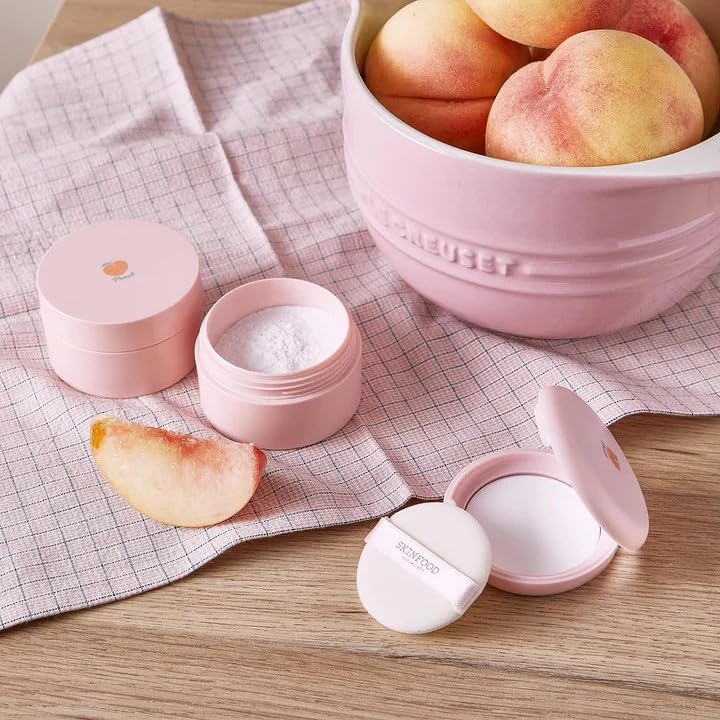 Skinfood Peach Cotton Pore Blur Pact compact held in hand